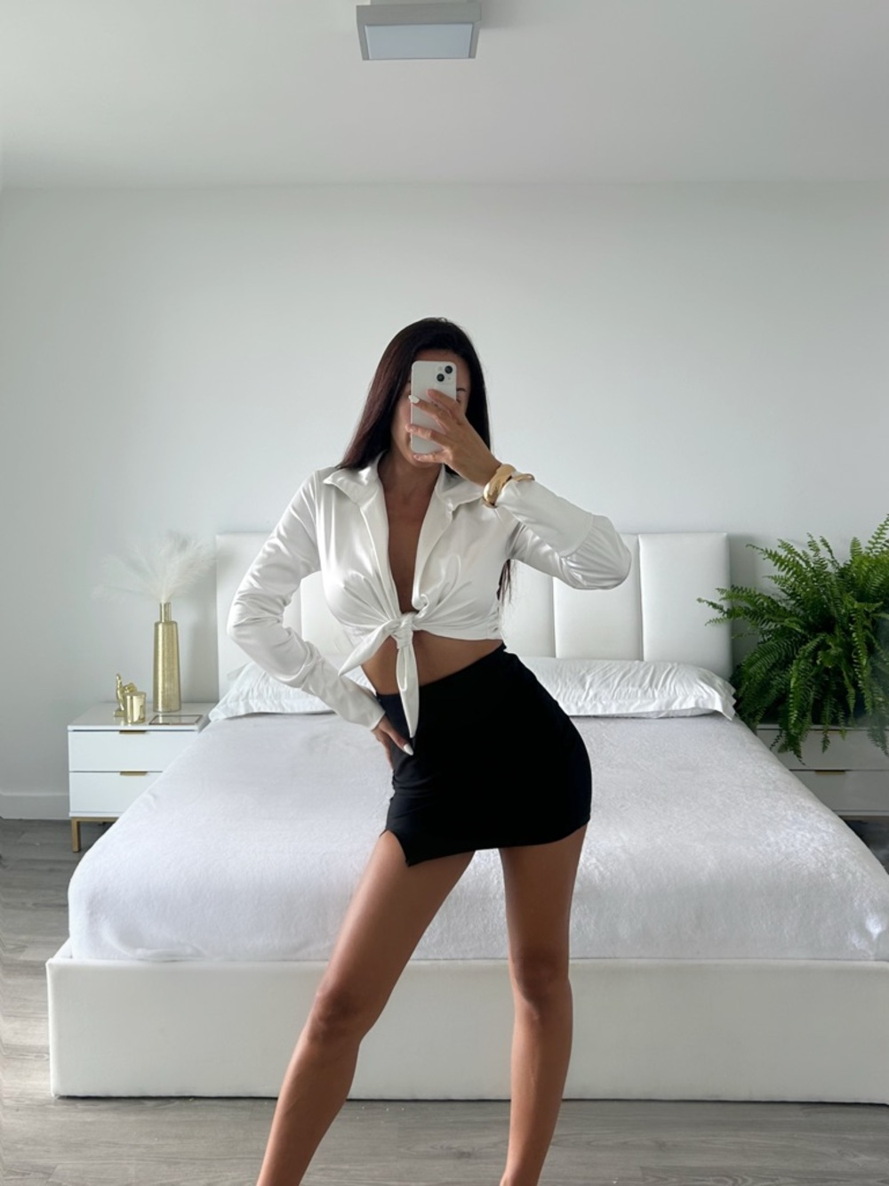 Cropped White Tie-Front Shirt with Black Mini Skirt